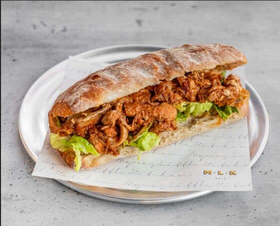 MLK Deli MJ's Chicken sandwich with marinated chicken thigh and lettuce